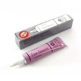 Birthday waterproof eyelash glue with strong hold and long-lasting pink adhesive for eyelash application.