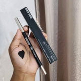 Beauty Glazed 24H Pure Kajal Liner in black, shown in a sleek pencil with the cap removed, ready for eye lining.