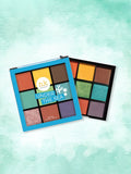 Nicka K Nine Color Eyeshadow Palette with vibrant ocean-inspired shades, featuring a variety of colors in a compact makeup palette.