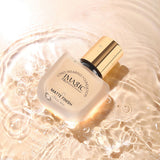 Liquid swatch of IMAGIC Matte Finish Foundation, showing a light porcelain tone with a soft-focus matte finish.