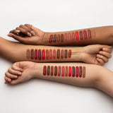 Swatch of MARS Matte Muse Mousse Lipstick Shade 14 Runway Queen showing soft, matte pink color on skin.