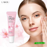 Model applying Laikou Japan Sakura Eye Cream in a 15g jar, showcasing smooth skin and eye care routine.